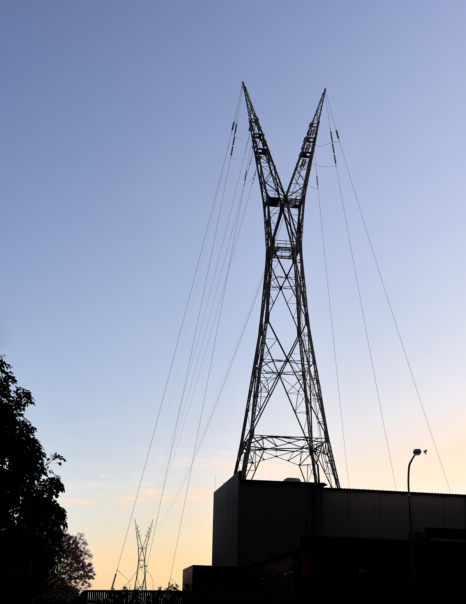 high voltage powerlines in newstead, sillouetted